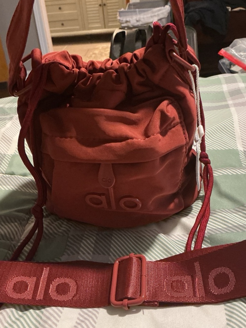 ALO Yoga Brick Red Drawstring Crossbody Bag